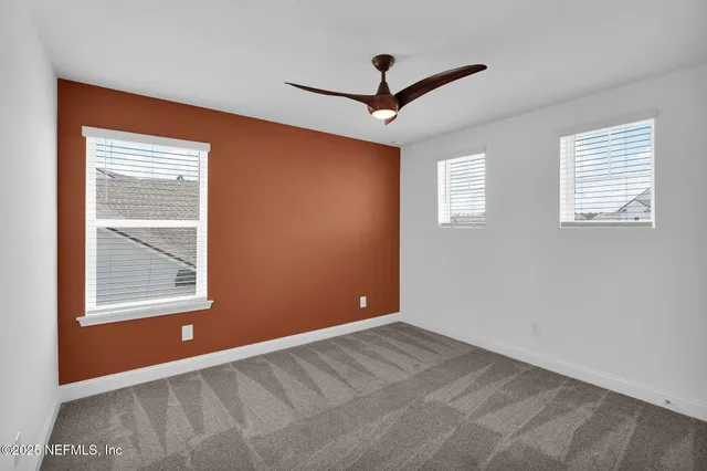 a view of a yard in front of house