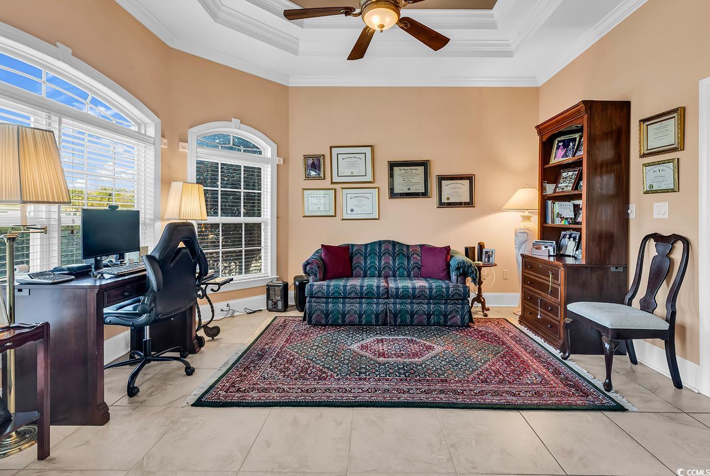 801 Bluffview Drive Myrtle Beach, SC 29579 - Photo 19 of 40 Office area with a tray ceiling, ceiling fan, and crown molding