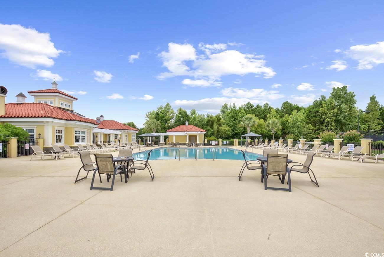 801 Bluffview Drive Myrtle Beach, SC 29579 - Photo 33 of 40 Community pool with a patio