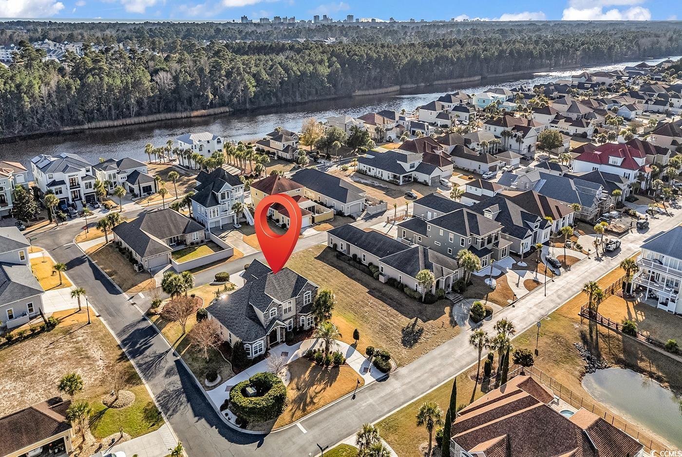 801 Bluffview Drive Myrtle Beach, SC 29579 - Photo 36 of 40 Aerial view of residential area featuring a nearby body of water