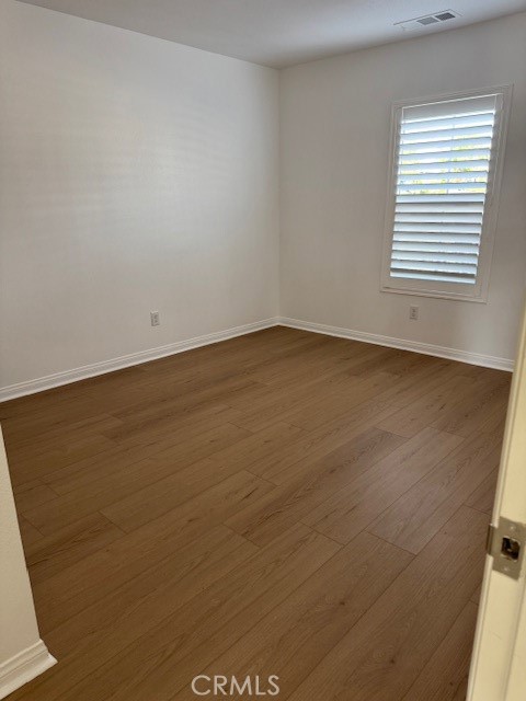 7613 Steamboat Street Riverside, CA 92507 - Photo 5 of 17 an empty room with a window