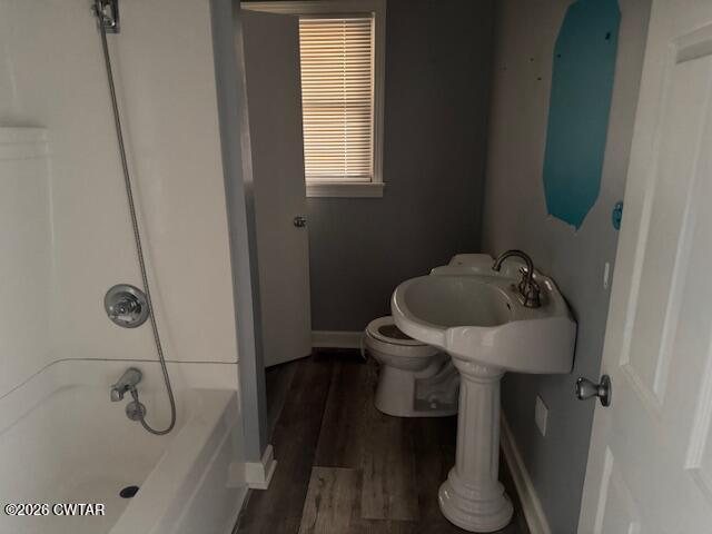 2455 Highway 64 Adamsville, TN 38310 - Photo 14 of 18 a bathroom with a sink and toilet