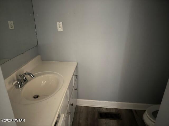 2455 Highway 64 Adamsville, TN 38310 - Photo 17 of 18 a bathroom with a sink and cabinets
