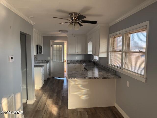 2455 Highway 64 Adamsville, TN 38310 - Photo 9 of 18 a kitchen with a counter space a sink appliances and cabinets