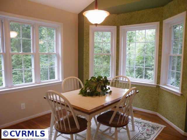4711 Ball Cypress Road Chesterfield, VA 23832 - Photo 8 of 10 Other - New ceramic tile in added sunroom with vaulted ceiling