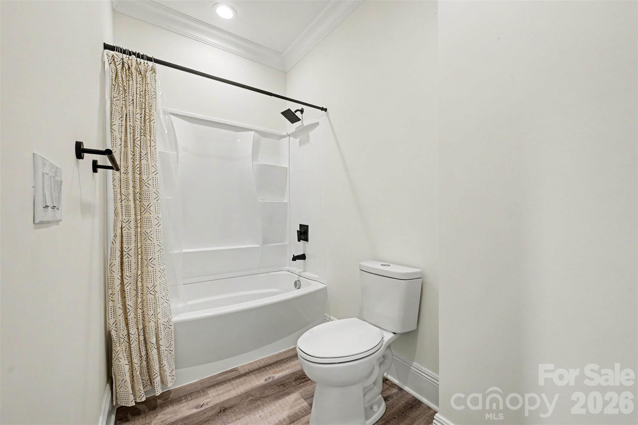 31 Ridgecrest Avenue Peachland, NC 28133 - Photo 23 of 30 a bathroom with a toilet and shower