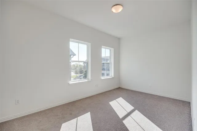 a bathroom with a granite countertop sink a toilet and bathtub