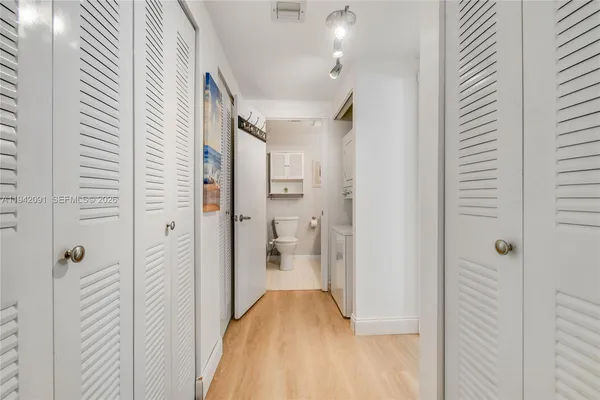 a bathroom with a granite countertop shower