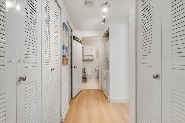 a bathroom with a granite countertop shower
