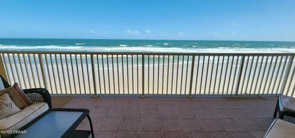 a view of a balcony with an outdoor space