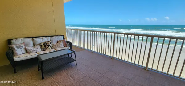 a view of a terrace with a bench
