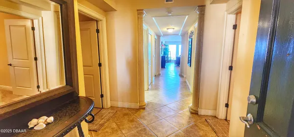 a view of an entryway with front door