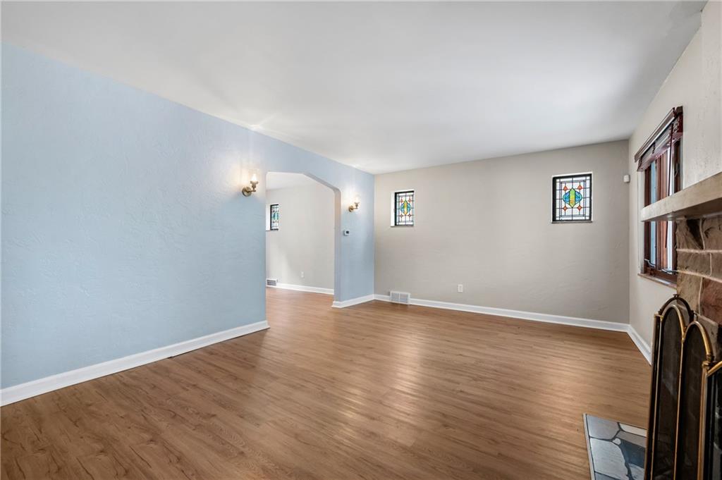3729 Baytree Street Pittsburgh, PA 15214 - Photo 6 of 30 an empty room with wooden floor and a window