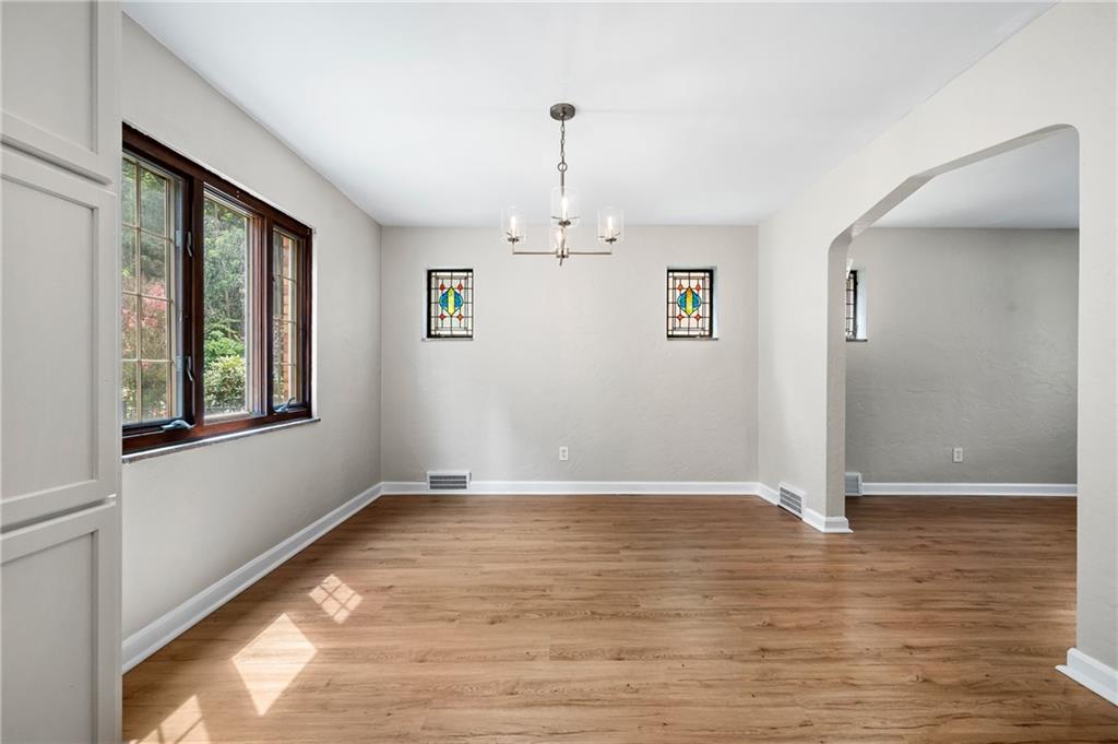 3729 Baytree Street Pittsburgh, PA 15214 - Photo 9 of 30 wooden floor in an empty room with a window