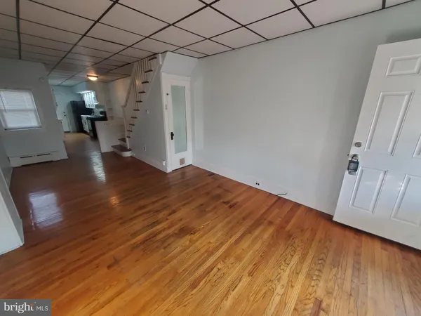 a view of a livingroom with wooden floor
