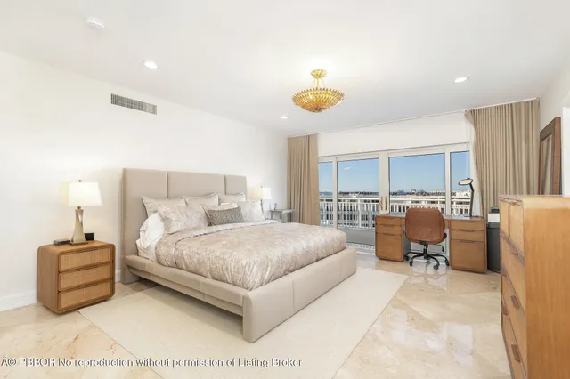 a bathroom with a shower and a sink