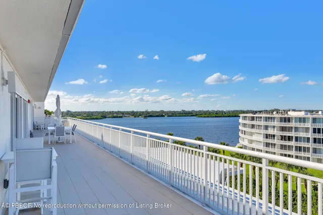 a view of balcony with furniture