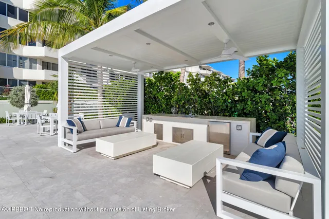 a view of a swimming pool with a lounge chairs
