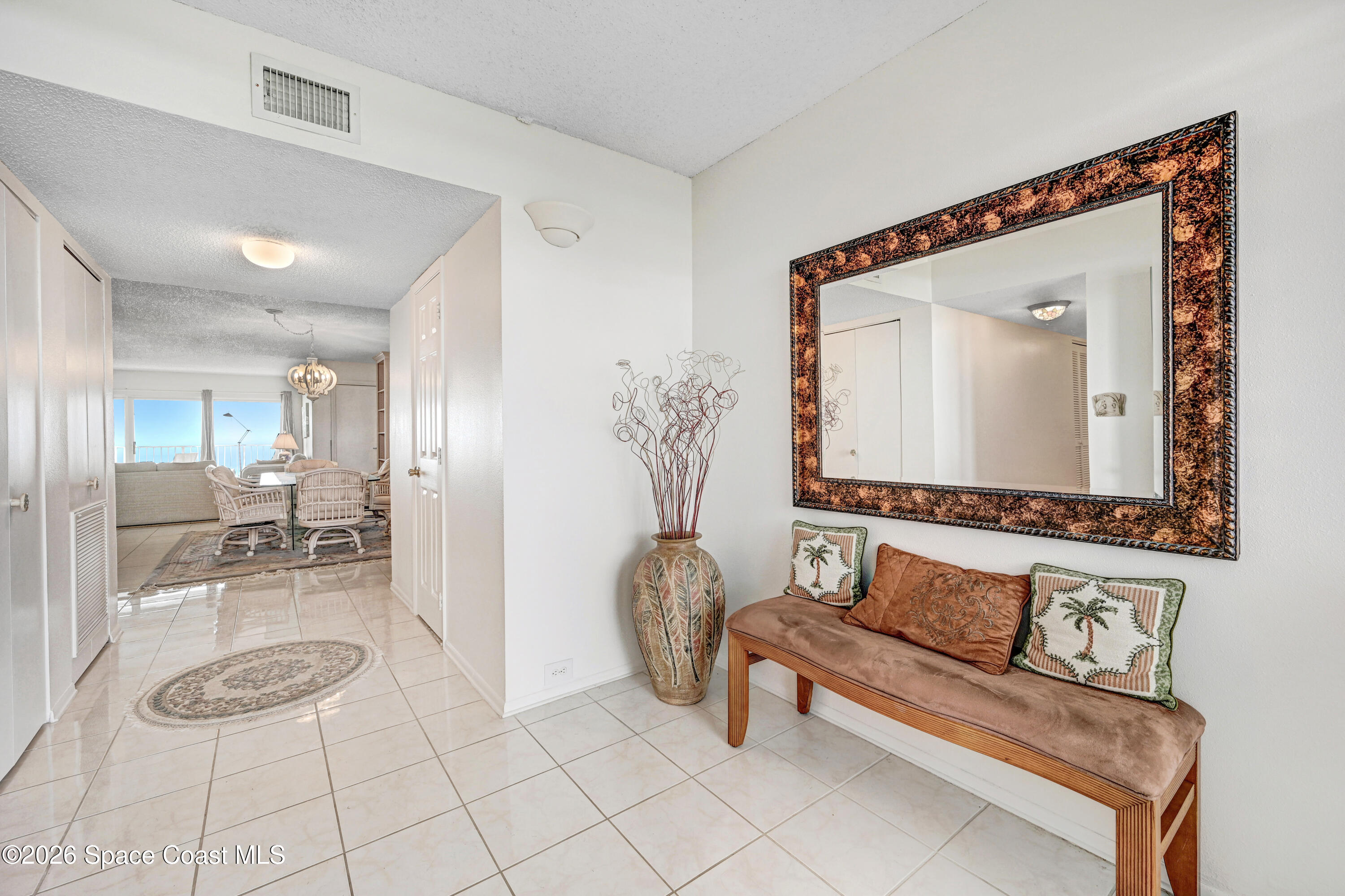 2101 Atlantic Street, Unit 533 Melbourne Beach, FL 32951 - Photo 9 of 51 a living room with furniture