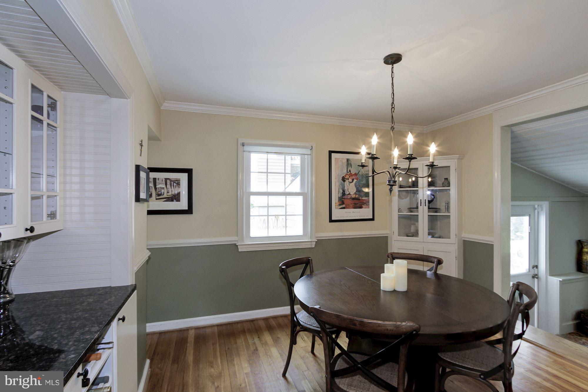 10409 Grandin Road Silver Spring, MD 20902 - Photo 8 of 28 Dining room with corner curio cabinet