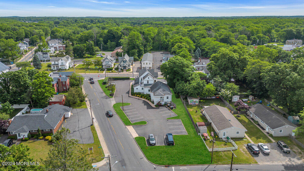 Main Street Farmingdale, NJ 07727 - Photo 14 of 23 an aerial view of a house with outdoor space and garden