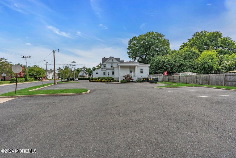 Main Street Farmingdale, NJ 07727 - Photo 7 of 23 a view of a road with a play ground in the back