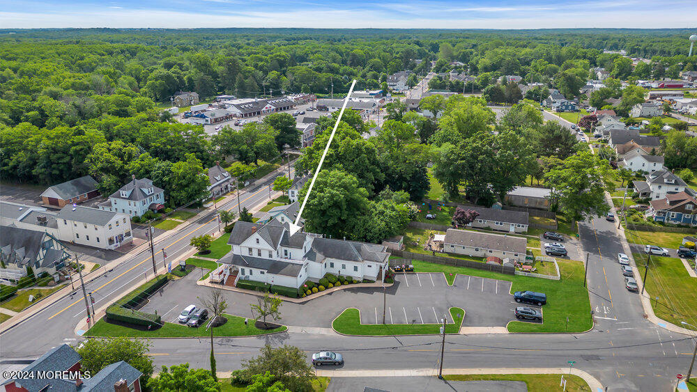 Main Street Farmingdale, NJ 07727 - Photo 10 of 23 an aerial view of residential houses with outdoor space and parking