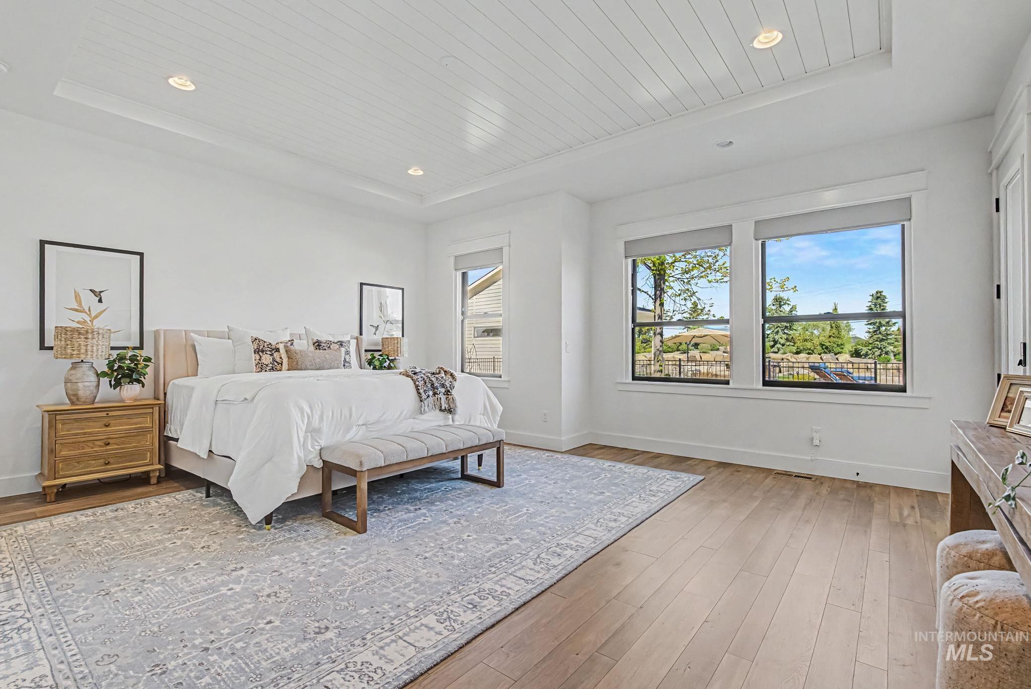 6521 South Pemberley Way Meridian, ID 83642 - Photo 22 of 42 Tray ceiling with shiplap detail and recessed lighting