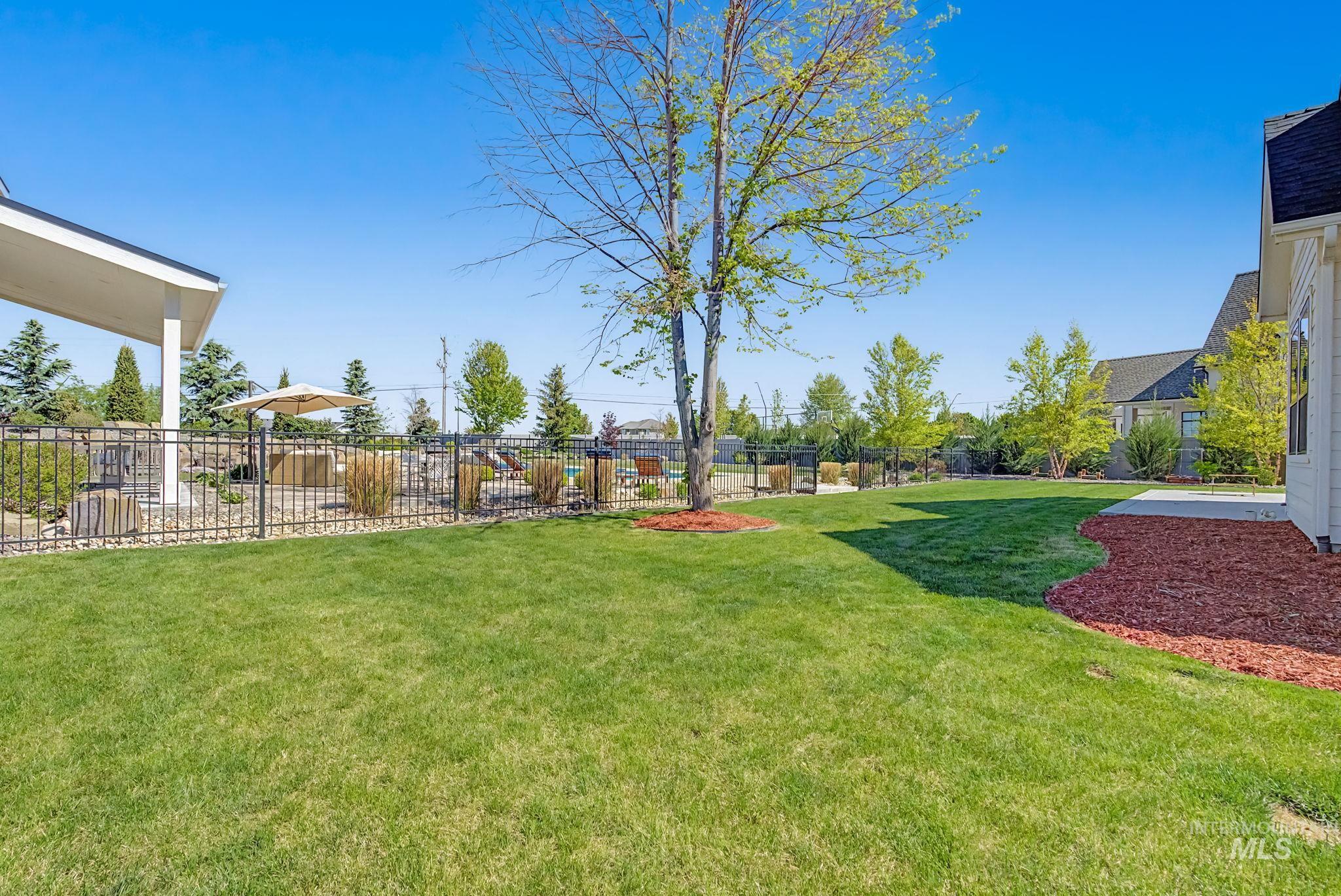 6521 South Pemberley Way Meridian, ID 83642 - Photo 33 of 42 Expansive green lawn providing ample outdoor space