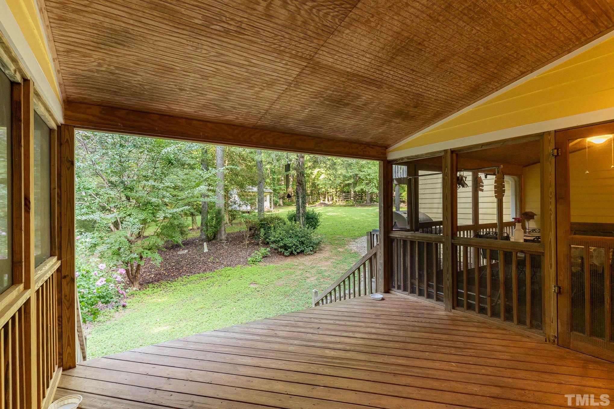 6913 Pinnacle Ridge Road Raleigh, NC 27603 - Photo 27 of 34 a view of a patio with wooden floor