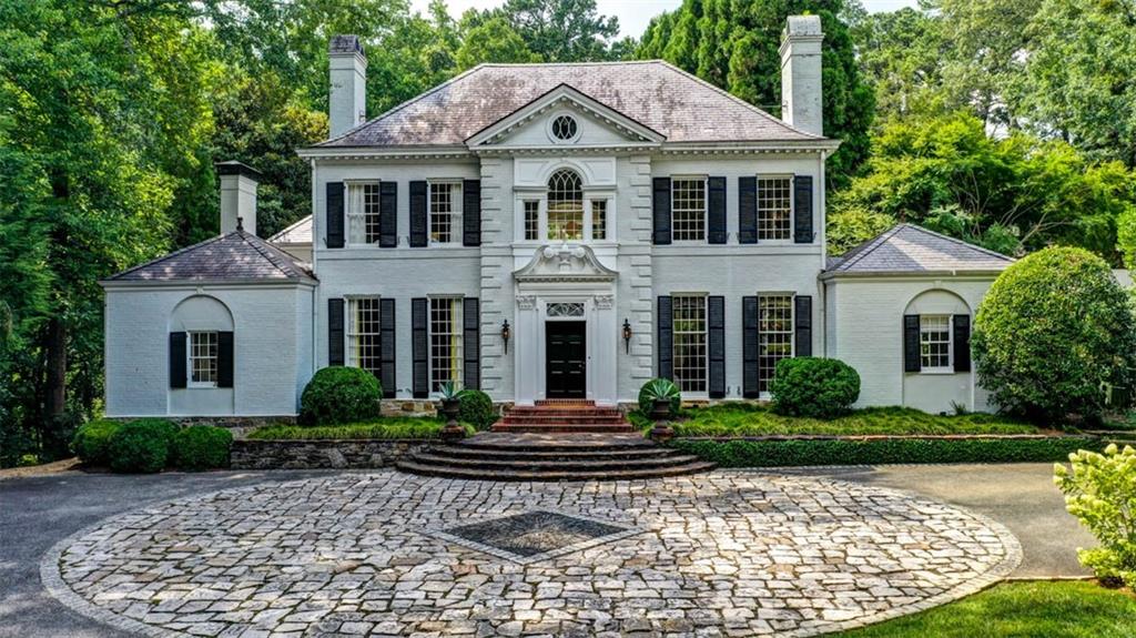 3200 Habersham Road Northwest Atlanta, GA 30305 - Photo 1 of 1 a front view of a house with garden