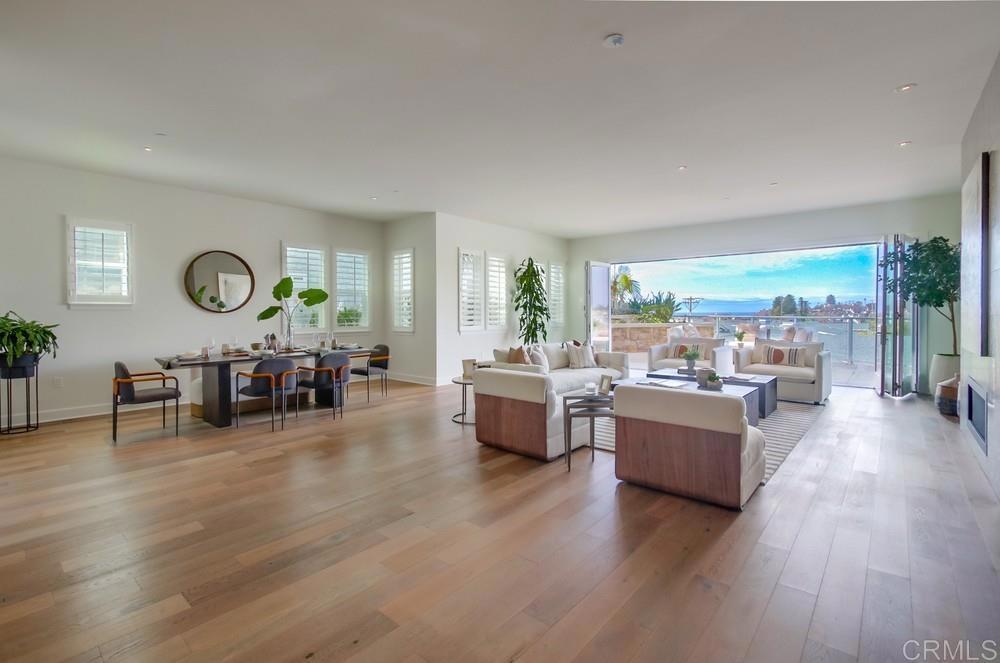 2333 Ocean Street Carlsbad, CA 92008 - Photo 14 of 67 a living room with furniture and a large window