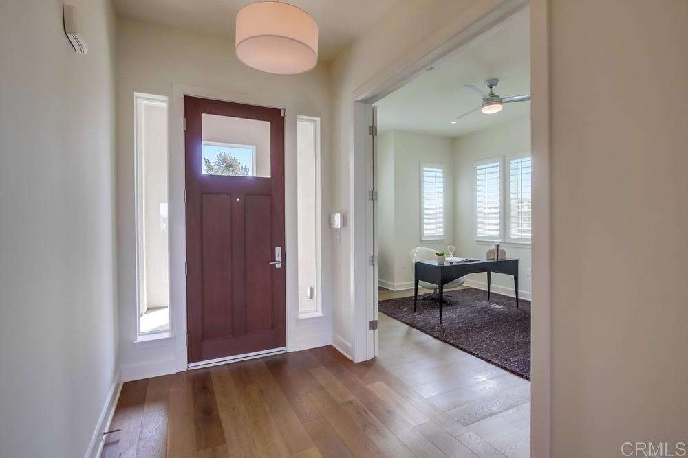 2333 Ocean Street Carlsbad, CA 92008 - Photo 37 of 67 wooden floor in a hall with an entryway