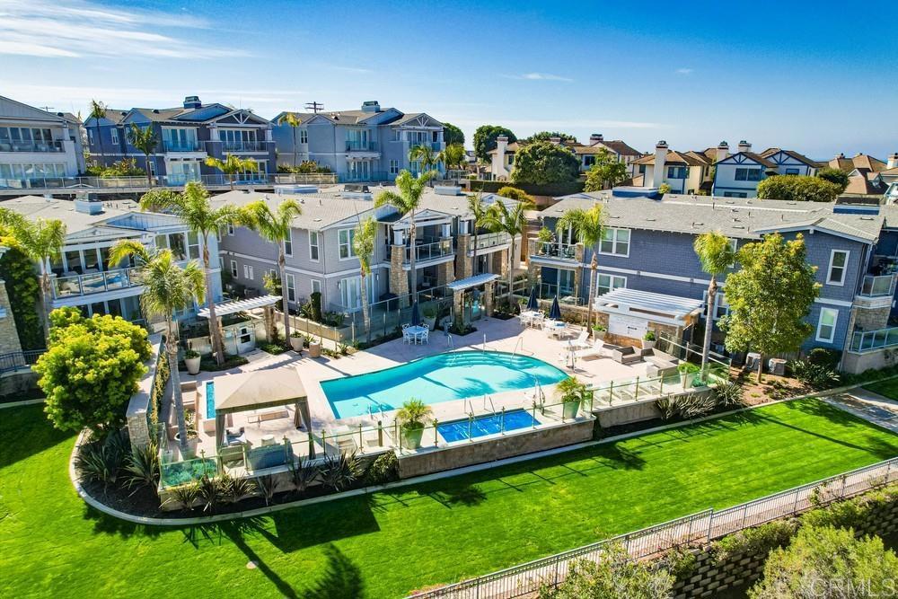 2333 Ocean Street Carlsbad, CA 92008 - Photo 45 of 67 a view of swimming pool with outdoor seating and yard
