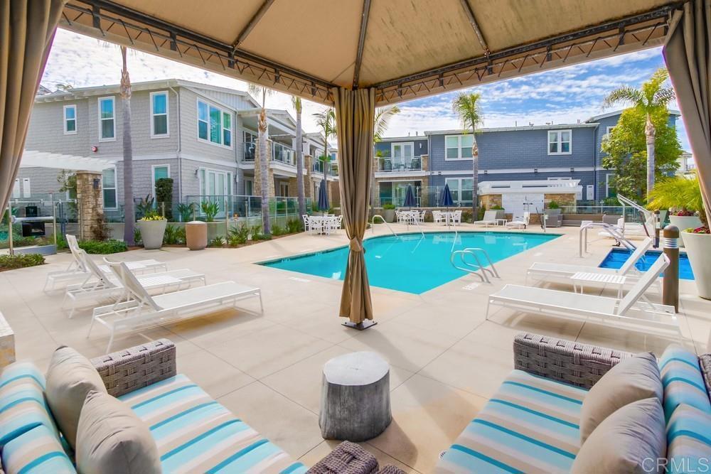2333 Ocean Street Carlsbad, CA 92008 - Photo 47 of 67 a view of a patio with a table and chairs