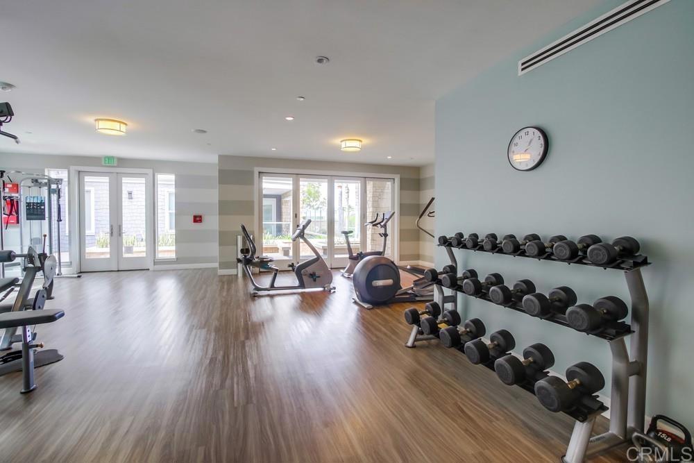 2333 Ocean Street Carlsbad, CA 92008 - Photo 62 of 67 a living room with lots of furniture and wooden floor
