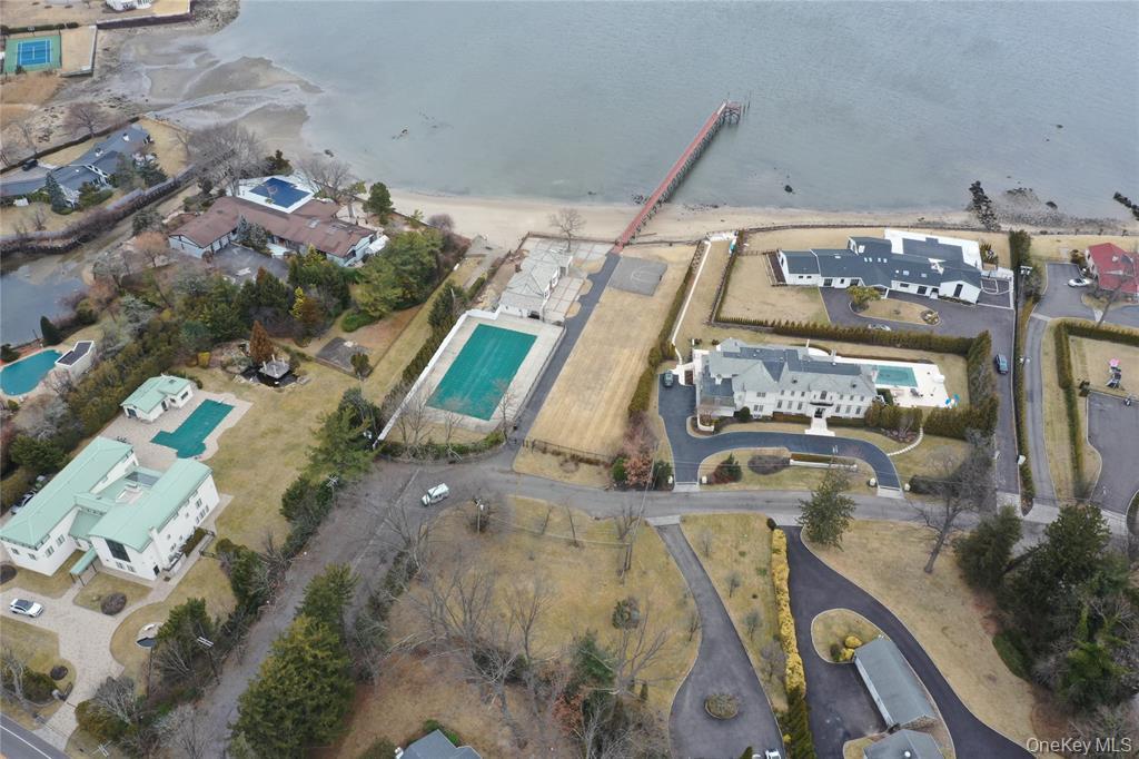 31 Harbour Road Great Neck, NY 11024 - Photo 7 of 12 an aerial view of a swimming pool
