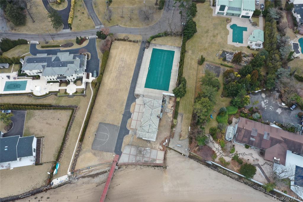 31 Harbour Road Great Neck, NY 11024 - Photo 8 of 12 an aerial view of a house with outdoor space