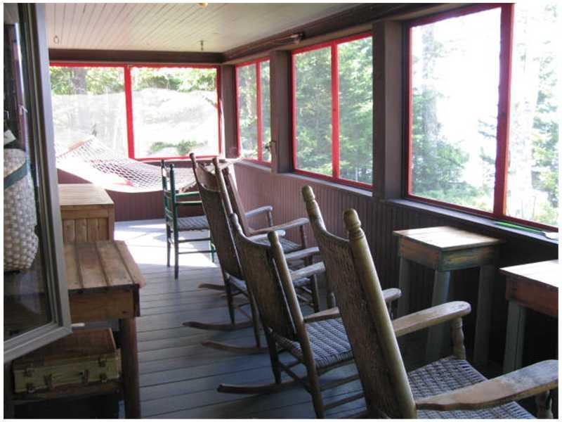 79 Bald Mountain Road Oquossoc, ME 04964 - Photo 5 of 15 Other. Front porch facing lake.