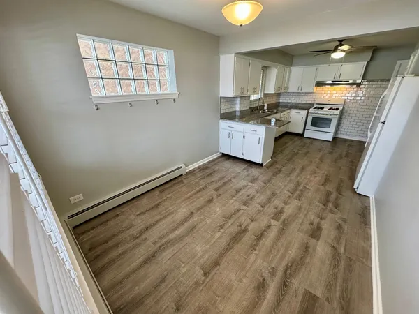 a workspace with wooden floor