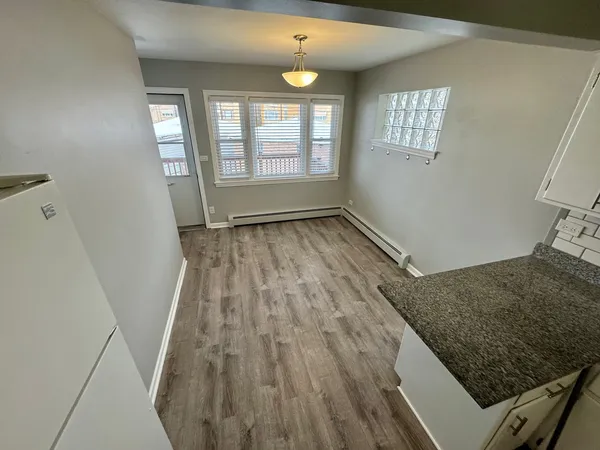 a view of an empty room and window