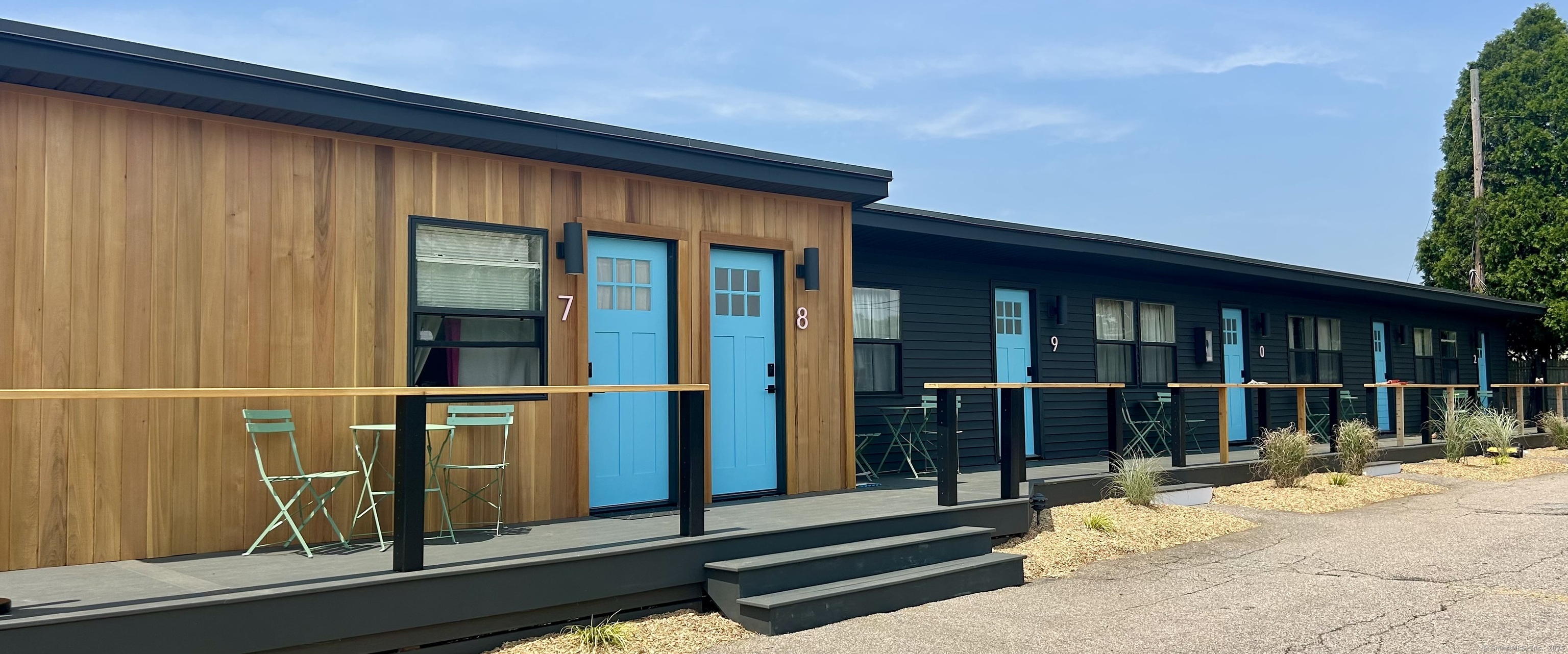 901 Stonington Road Stonington, CT 06379 - Photo 6 of 6 a view of a house with a large window