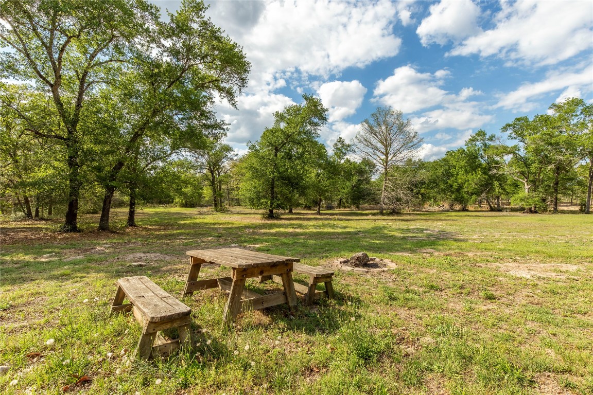 636 Deer Run Road Bellville, TX 77418 - Photo 19 of 23 a view of a yard with swimming pool