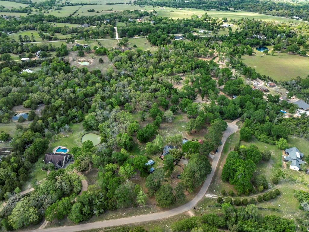 636 Deer Run Road Bellville, TX 77418 - Photo 22 of 23 an aerial view of residential house with outdoor space and trees all around