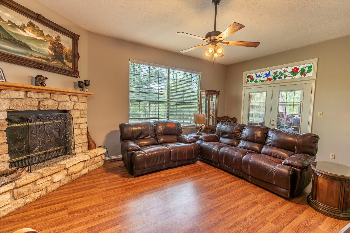 636 Deer Run Road Bellville, TX 77418 - Photo 7 of 23 a living room with furniture and a fireplace