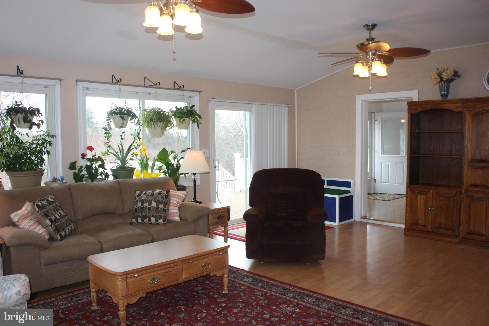 1563 Bollinger Road Westminster, MD 21157 - Photo 15 of 24 BEAUTIFUL LAMINATE FLOORING W/ CIELING FANS