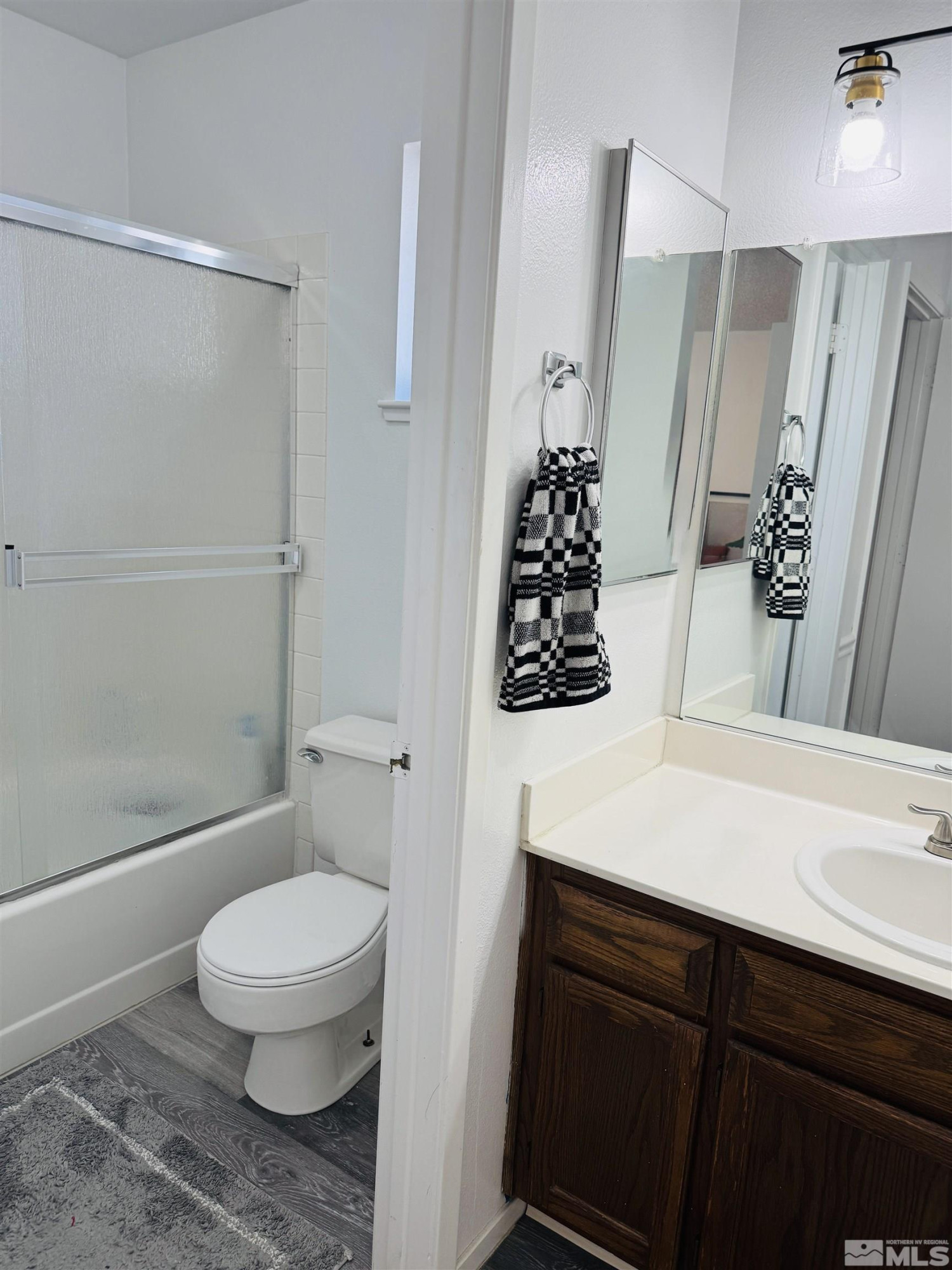 4360 Perro Lane Reno, NV 89502 - Photo 16 of 27 a bathroom with a sink a toilet and shower