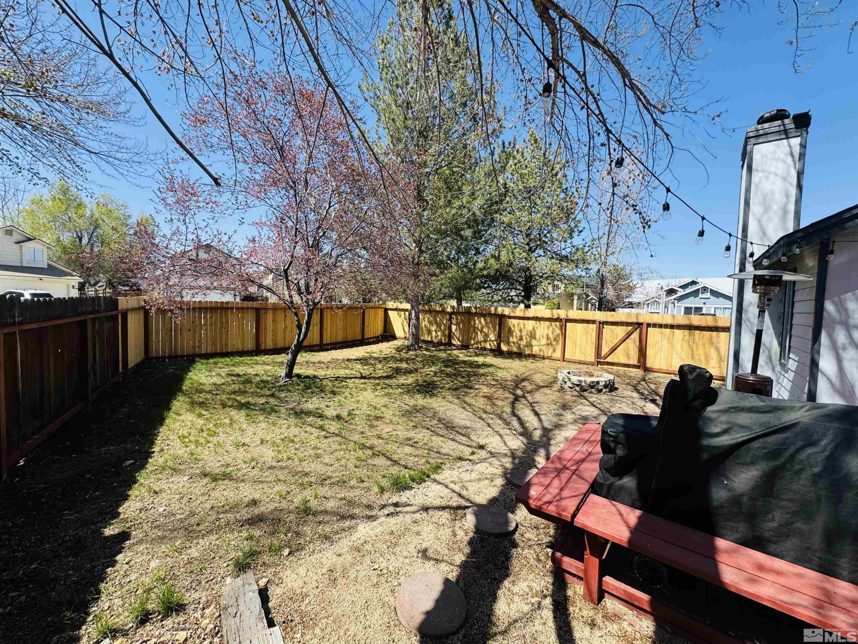4360 Perro Lane Reno, NV 89502 - Photo 23 of 27 a view of a backyard with sitting area
