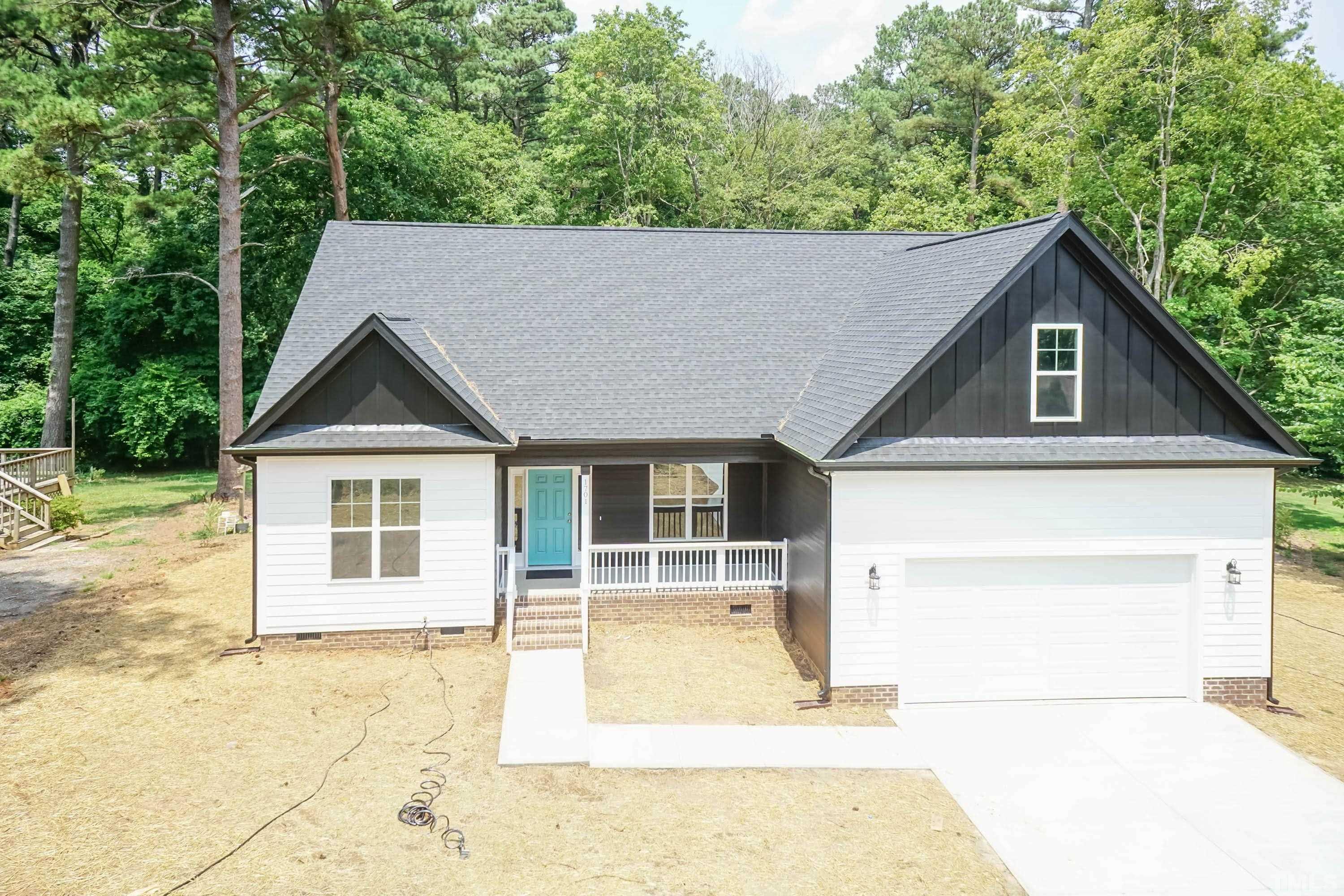 1701 Honeysuckle Road Raleigh, NC 27609 - Photo 29 of 29 a house view with a outdoor space