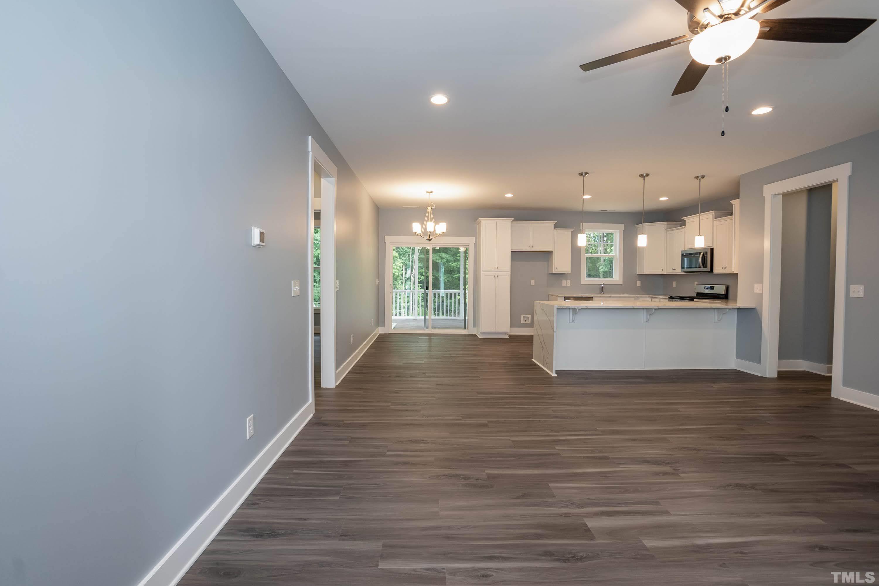 1701 Honeysuckle Road Raleigh, NC 27609 - Photo 5 of 29 a view of kitchen with wooden floor